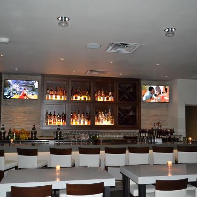 Maple wood back bar cabinets with lighting